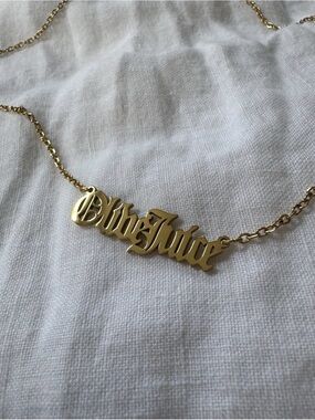 OLIVE JUICE martini gothic font IP gold
Plated necklace